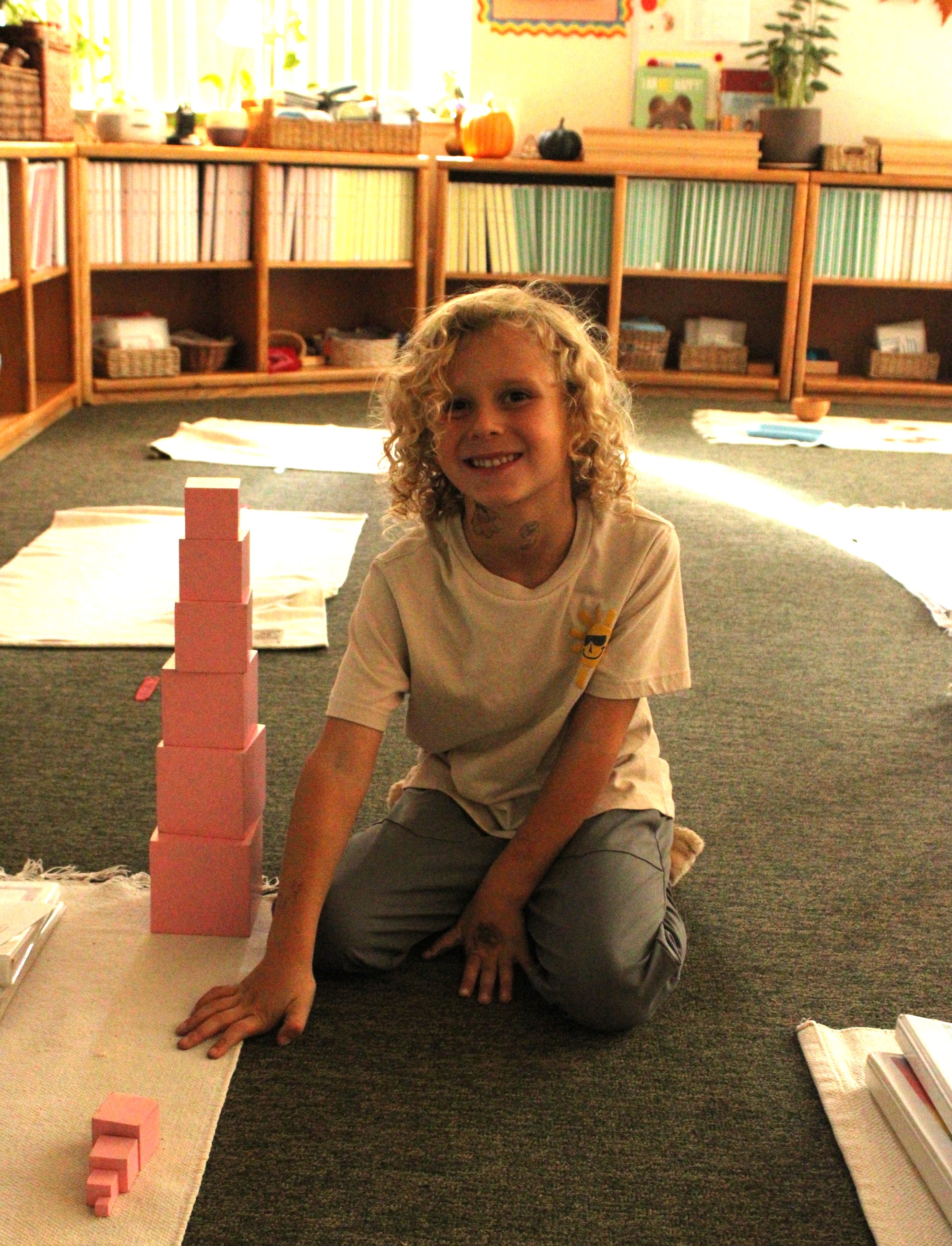 student with pink tower
